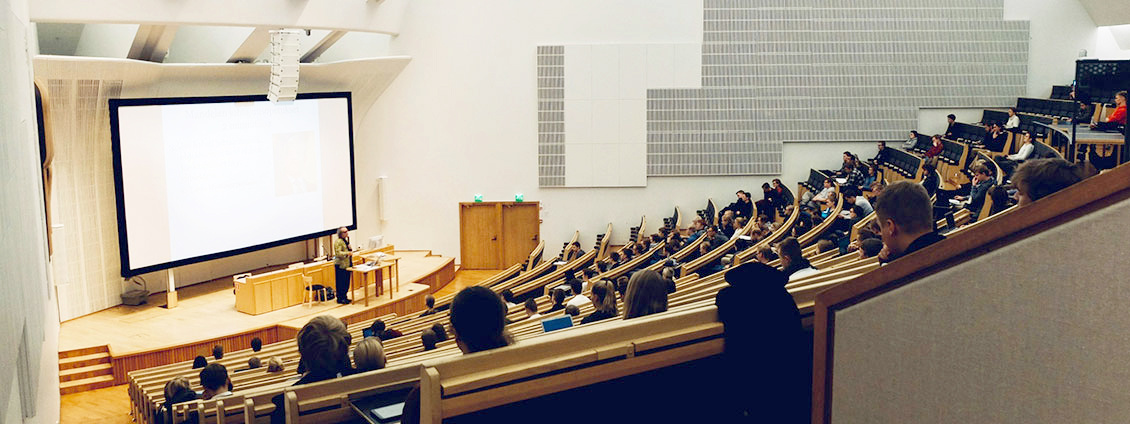 An empty lecture theatre prepared for a model PU teaching session